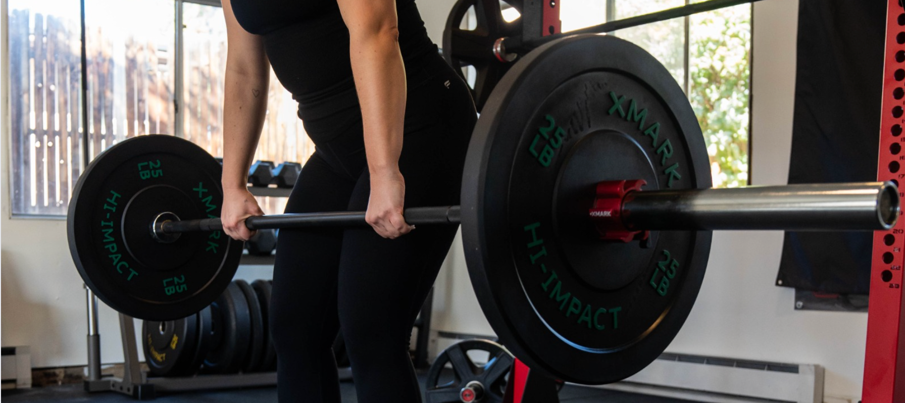 Woman Holding Barbell for Deadlift